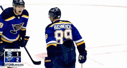 Two Hockey Players One With Number 89 GIF