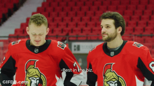 Two Hockey Players Saying Best In The Biz GIF