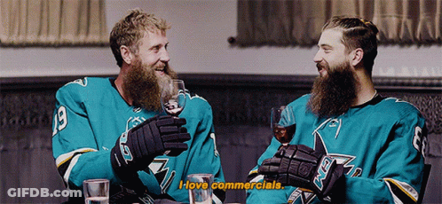 Two Hockey Players Wine Saying I Love Commercials GIF