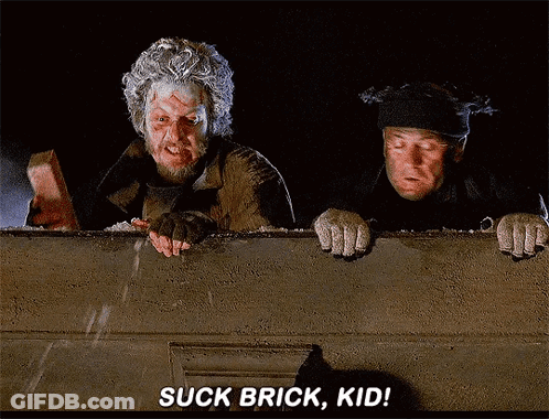 Two Homeless Men Looking Over Wall Suck Brick Kid GIF