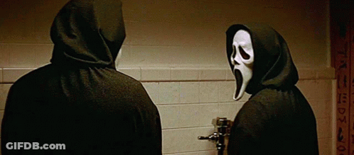 Two Hooded Men In Masks In Bathroom GIF