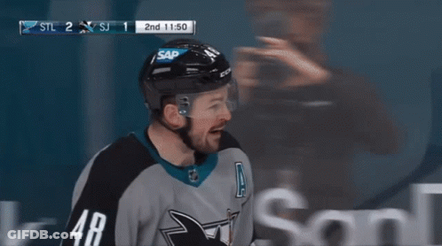 Two Ice Hockey Players Posing In CCM Helmets GIF