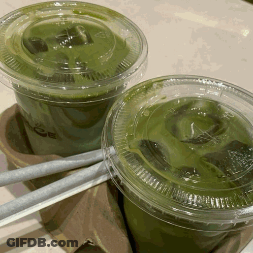 Two Iced Green Teas With Straws GIF