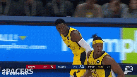 Two Indiana Pacers Basketball Players On A Court GIF