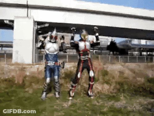 Two Kamen Riders Jumping In Front Of Bridge GIF
