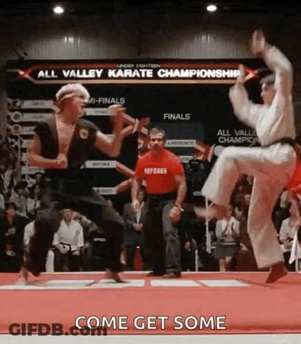 Two Karate Fighters Jumping Come Get Some GIF