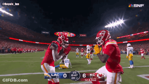 Two KC Football Players Celebrating Touchdown GIF
