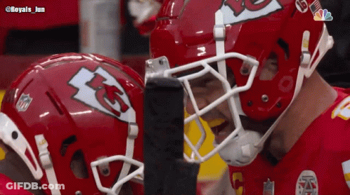 Two KC Football Players Looking At Each Other GIF