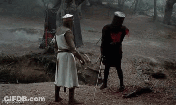 Two Knights In Woods One Holding Sword GIF