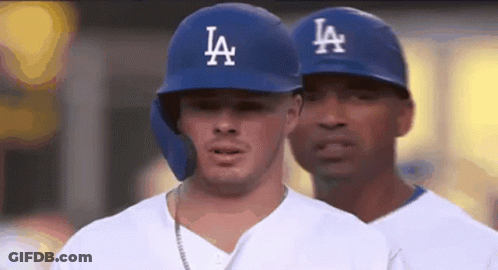 Two LA Dodgers Baseball Players Standing Together GIF
