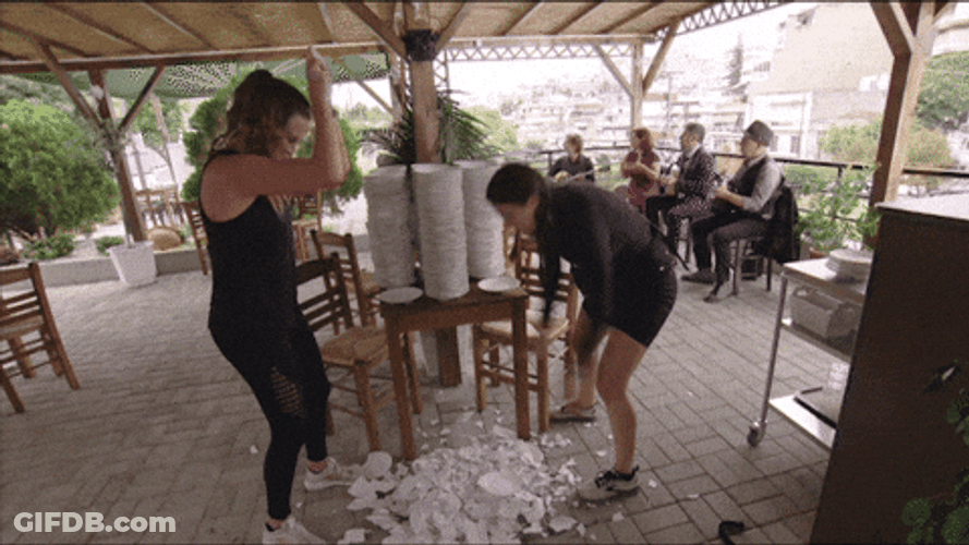 Two Ladies Breaking Plates GIF