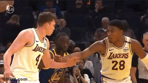 Two Lakers Basketball Players Shaking Hands GIF