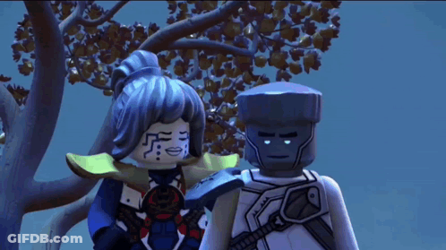 Two Lego Figures Beside Trees GIF
