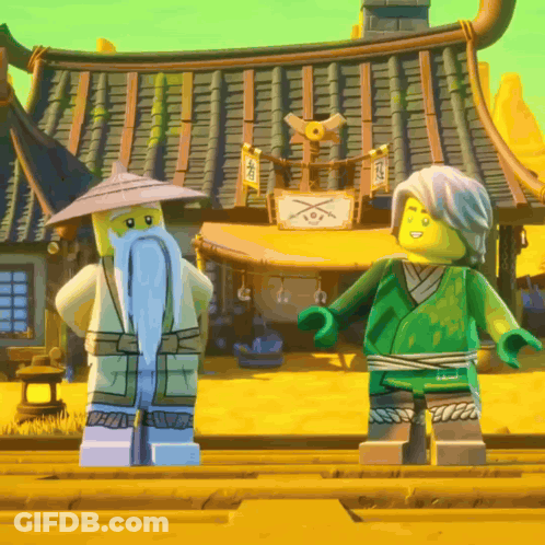 Two Lego Figures In Front Of Building With Chinese Writing GIF