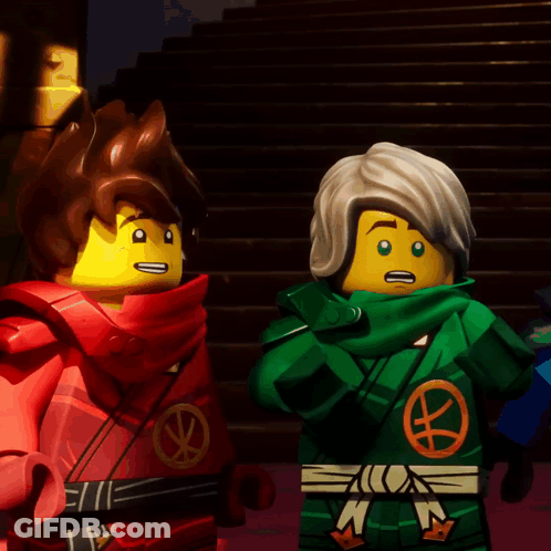 Two Lego Figures One In Green Outfit With Letter N GIF