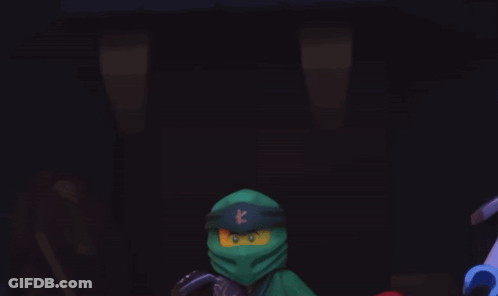 Two Lego Ninjas Standing In The Dark GIF