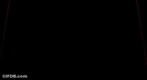 Two Lightsabers Are Glowing In The Dark With A Black Background GIF