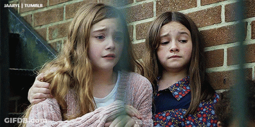 Two Little Girls Are Hugging Each Other In Front Of A Brick Wall And The Words Tumblr Are On The Bottom GIF