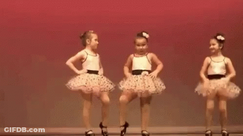 Two Little Girls Dancing In Tutus GIF