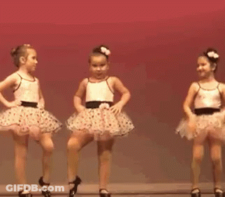 Two Little Girls Dancing On Stage GIF