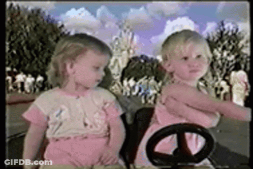 Two Little Girls In Toy Car GIF