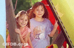 Two Little Girls One Wearing Baseball Shirt GIF