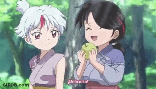 Two Little Girls Standing Together One Holding Apple GIF