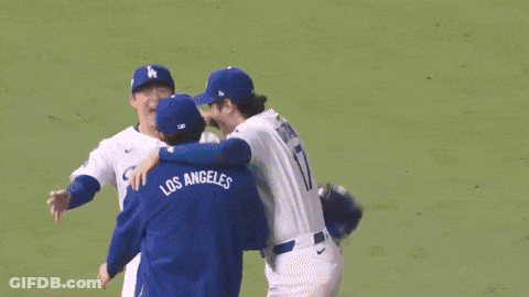 Two Los Angeles Baseball Players Hugging GIF