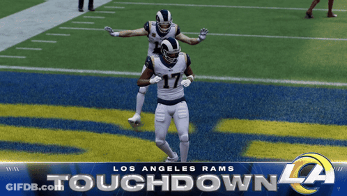 Two Los Angeles Rams Football Players On A Field GIF