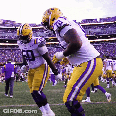 Two LSU Football Players Number 50 And 73 GIF