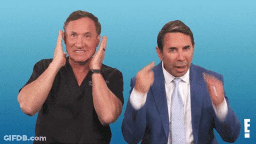 Two Man Ear Plugs Their Ears Together GIF