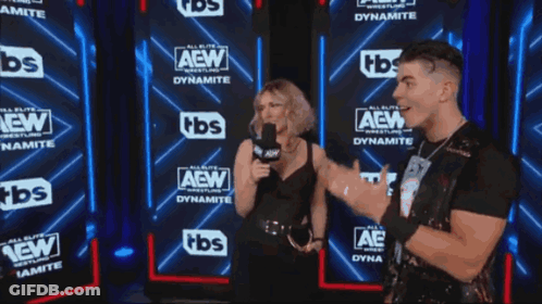Two Men And A Woman Are Standing In Front Of A Wall That Says Aew GIF