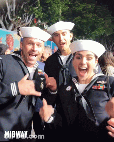 Two Men And A Woman Dressed As Sailors GIF