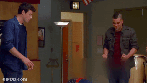 Two Men And Woman In Front Of Exit Sign GIF