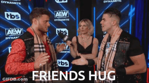 Two Men And Woman Talking Near Friends Hug Sign GIF