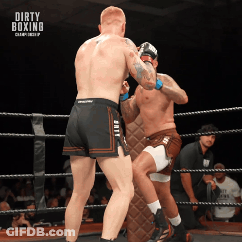 Two Men Are Boxing In A Dirty Boxing Championship Match GIF