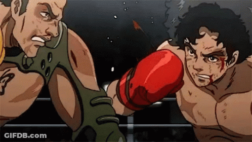 Two Men Are Boxing In A Ring And One Of Them Has Blood On His Face GIF