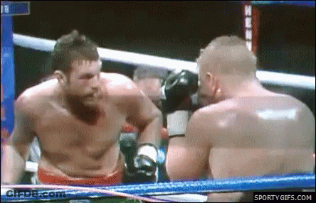 Two Men Are Boxing In A Ring With Sportygifs.com At The Bottom Of The Screen GIF