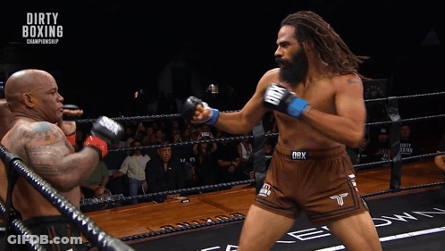 Two Men Are Boxing In A Ring With The Words Dirty Boxing Championship On The Bottom GIF