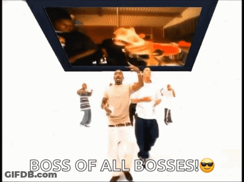 Two Men Are Dancing In Front Of A Screen That Says Boss Of All Bosses ! GIF