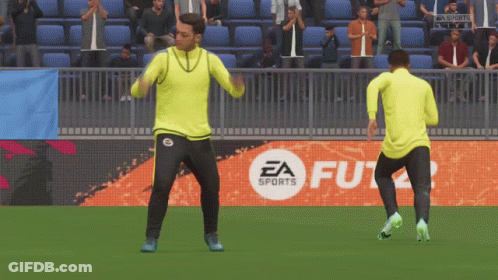 Two Men Dancing On Soccer Field In Front Of EA Sports Logo GIF