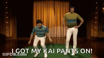 Two Men Are Dancing On A Stage With The Words `` I Got My Kai Pants On '' Written Below Them . GIF
