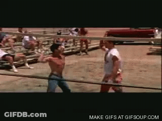 Two Men Are Fighting In A Boxing Ring And The Words Make Gifs At Gifsoup.com Are On The Bottom Of The Screen GIF