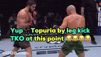Two Men Are Fighting In A Boxing Ring With A Caption That Says Yup Topuria By Leg Kick Tko At This Point GIF