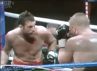Two Men Are Fighting In A Boxing Ring With The Website 4Gifs.com In The Corner GIF