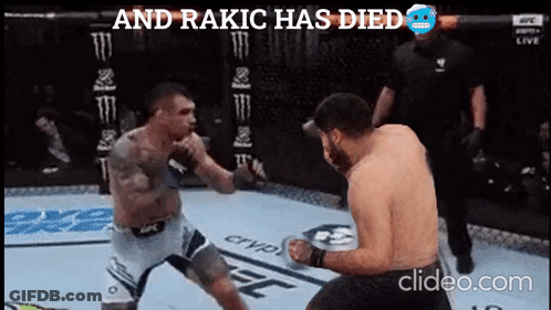 Two Men Are Fighting In A Boxing Ring With The Words And Rakic Has Died On The Bottom GIF