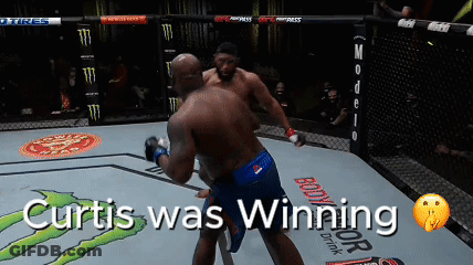 Two Men Are Fighting In A Boxing Ring With The Words Curtis Was Winning GIF