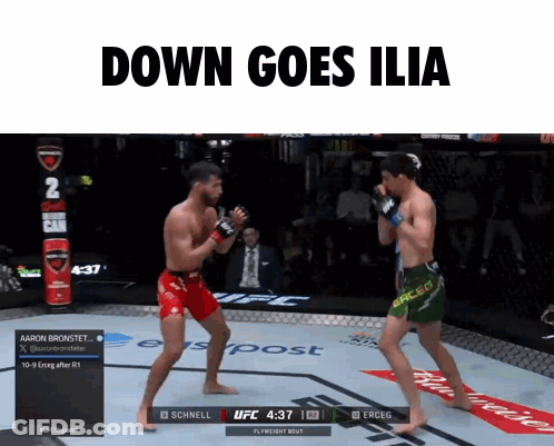 Two Men Are Fighting In A Boxing Ring With The Words " Down Goes Ilia " Above Them GIF