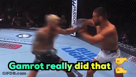 Two Men Are Fighting In A Boxing Ring With The Words Gamrot Really Did That Above Them GIF