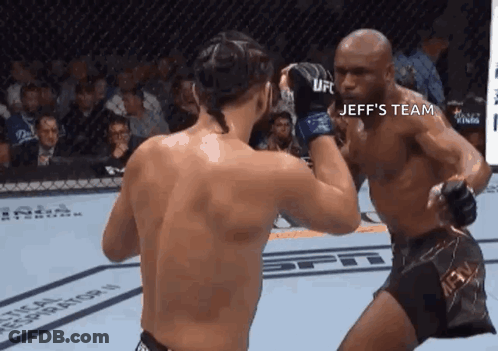 Two Men Are Fighting In A Boxing Ring With The Words Jeff 'S Team On The Bottom . GIF